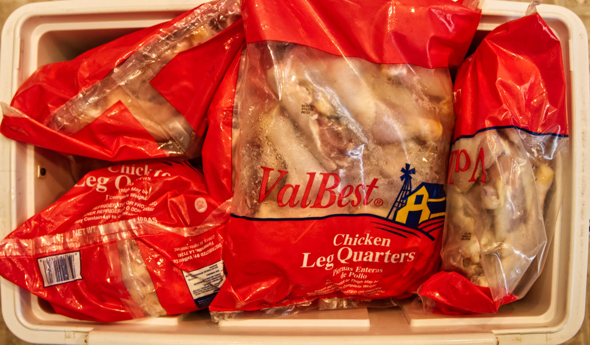 Chicken leg quarters in ten-pound bags